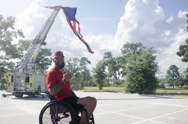 Wounded combat vet takes trek on handcycle from ground zero to St. Pete's