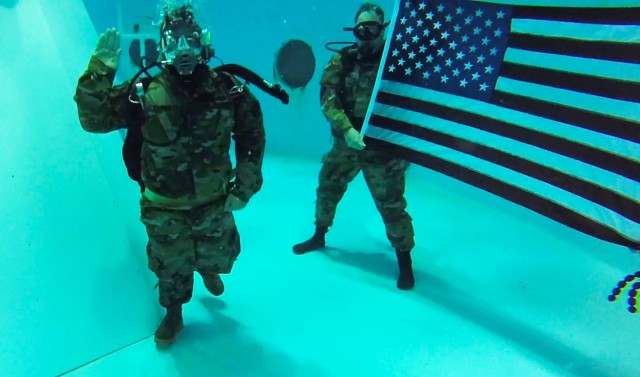 SMDC/ARSTRAT Soldier, Wounded Warrior reenlists 30 feet underwater