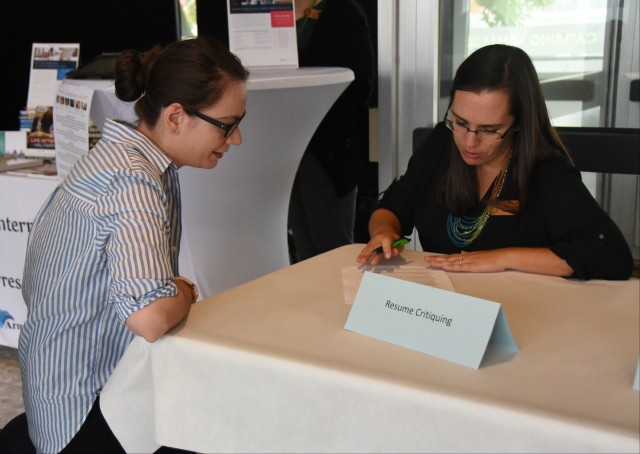 Lisa Steinacker does resume critiques at Benelux Employment, Volunteer and Career Expo