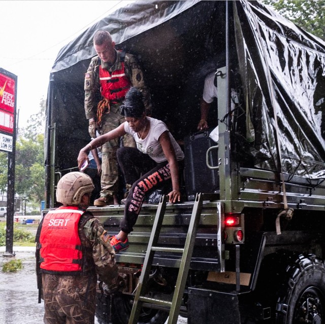 North Carolina Army National Guard Soldiers help evacuate residents affected by Hurricane Florence