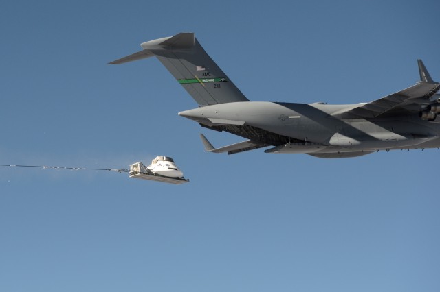 NASA capsule release from C-17 aircraft