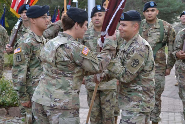 CSM Laragione passes the colors in final act as LRMC Troop Command senior enlisted
