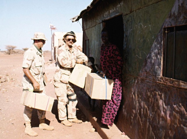 Special Forces Soldiers deliver supplies to Somali villagers