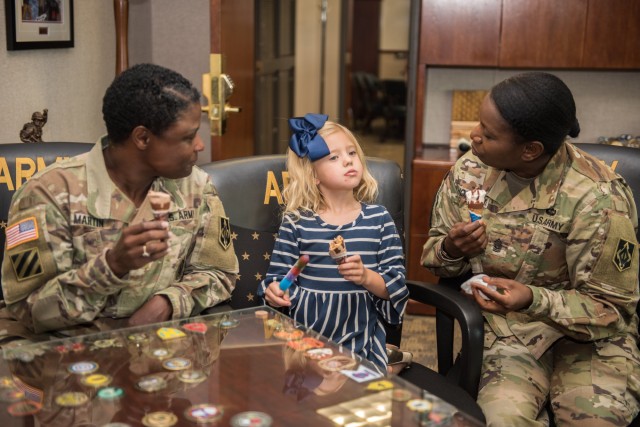 Military child explores Missouri while having ice cream with mayors