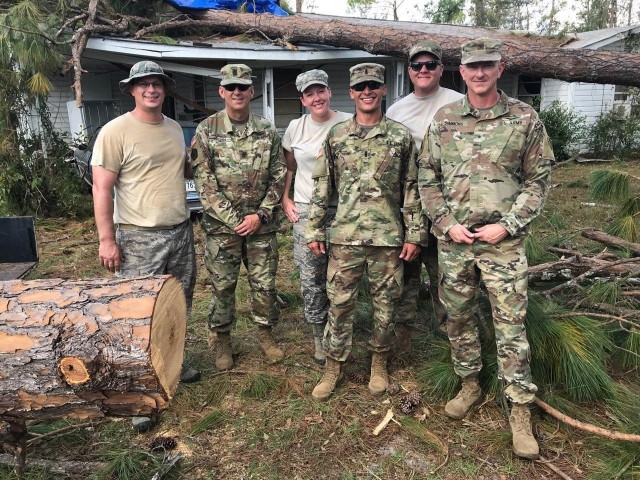 Soldiers and Airmen of the Georgia National Guard render emergency aid