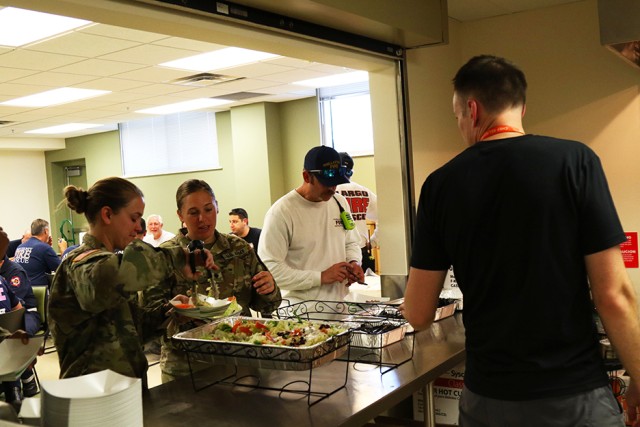 Guard members and volunteers provide for the community