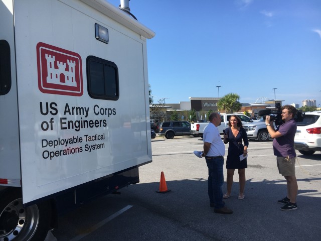 Army Corps personnel work to spread the word about Operation Blue Roof in Florida after Hurricane Michael