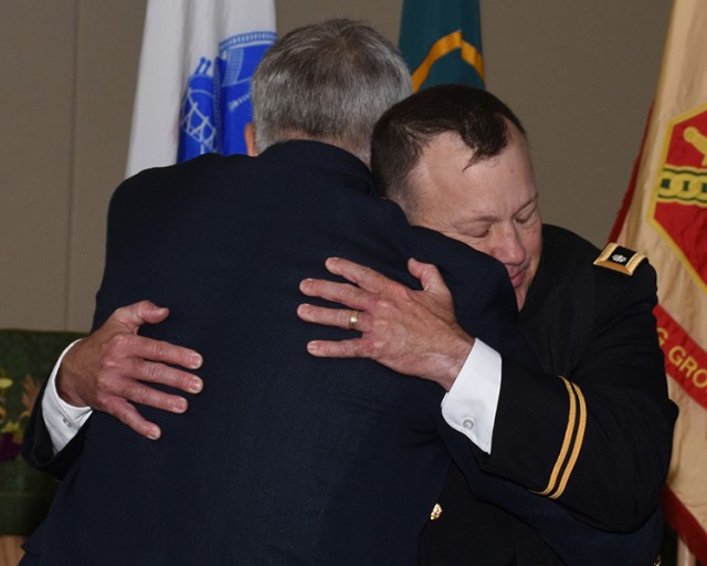 Chaplain Lester gives Army Strong hug at promotion