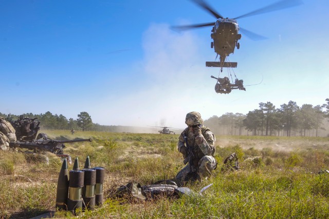 Panther Brigade Artillery Paratroopers Partner with 82nd Combat Aviation Brigade Aviators to Sling Load Howitzers, Conduct Live-Fire Exercise