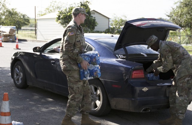 Texas Guard members provide supplies to flood victims