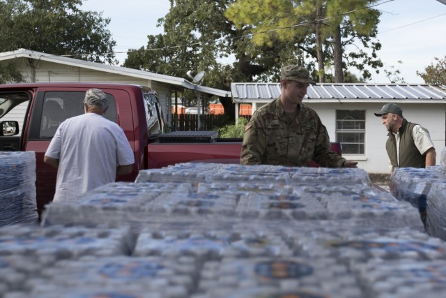 Texas Guard members provide supplies to flood victims