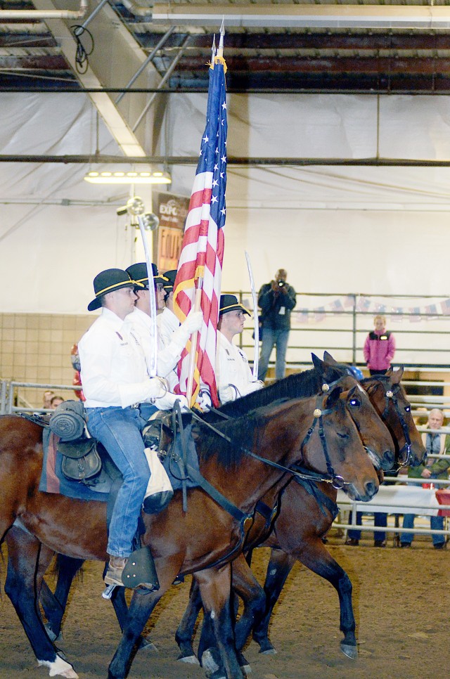 Fort Riley Soldiers, leader, open Professional Armed Forced Rodeo Associate World Championship Rodeo Oct. 25.