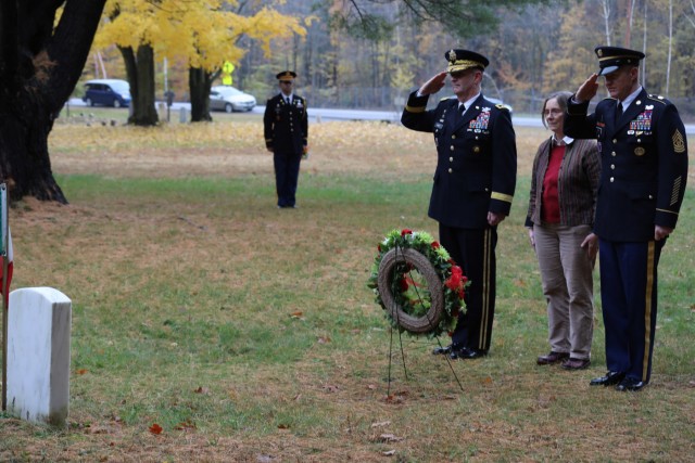 Fort Drum officials lay wreath at Italian POW grave to mark "National Unity Day"