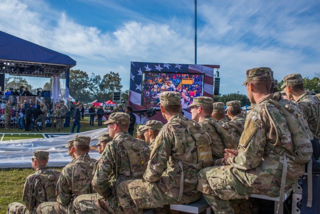 Soldiers watch football