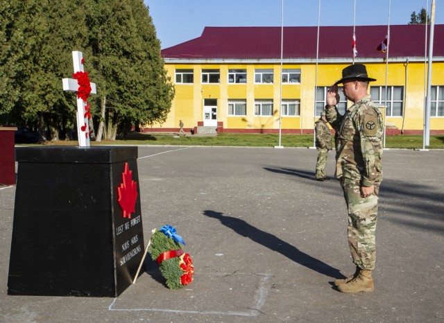 Multinational Soldiers deployed to Ukraine honor veterans