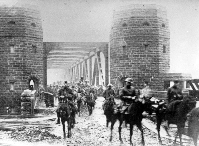 New York troops march into Germany to meet former foes as Army of Occupation