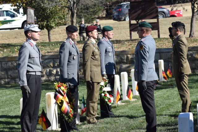 Nov. 15 ceremony at the post cemetery, wreaths were laid in memory of Italian and German World War II soldiers who died while being held as prisoner of war at Fort Riley.