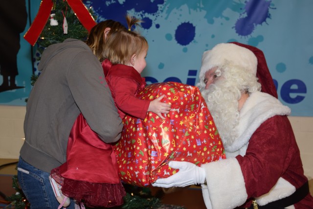 Santa visits orphans during holiday event at USAG Benelux