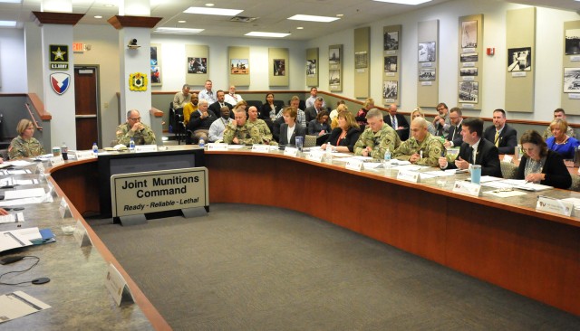 Brig. Gen. Michelle M. T. Letcher and other JMC senior leaders brief Gen. Gus Perna on JMC's continued efforts to support munitions readiness.