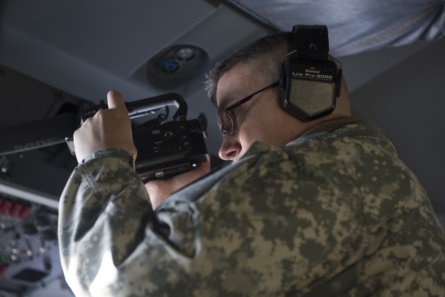 Alaska National Guard immediate aerial survey reduces earthquake havoc