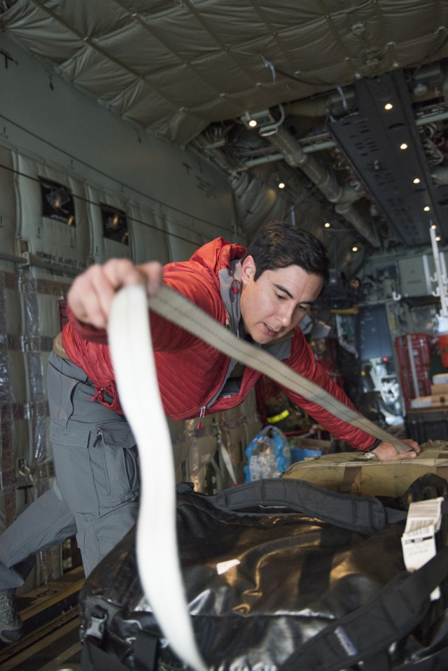 Alaska National Guard immediate aerial survey reduces earthquake havoc