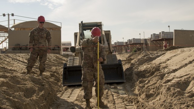 Soldiers repair flood damage across Kuwait