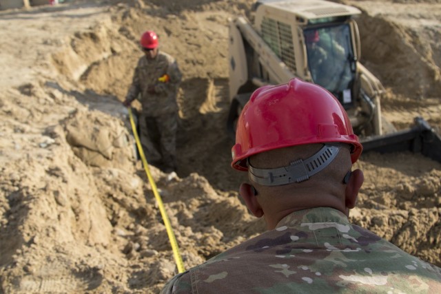 Soldiers repair flood damage across Kuwait