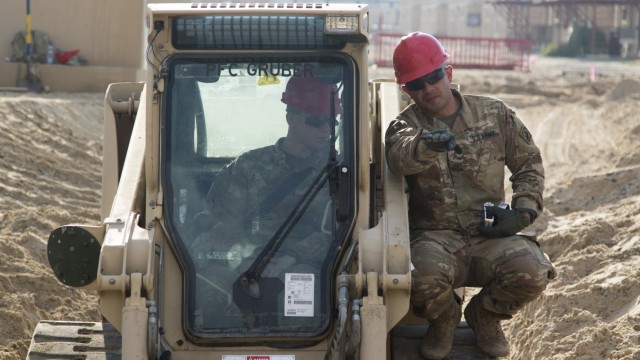 Soldiers repair flood damage across Kuwait