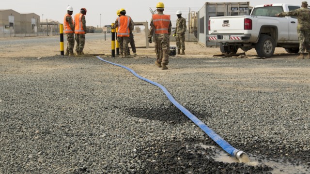 Soldiers repair flood damage across Kuwait