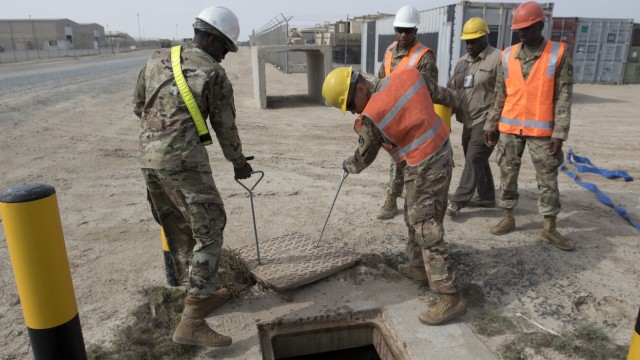 Soldiers repair flood damage across Kuwait