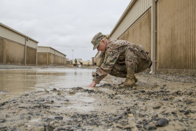 Soldiers repair flood damage across Kuwait