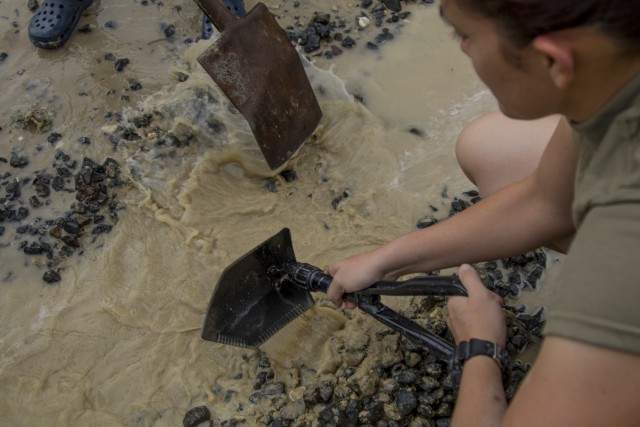 Soldiers repair flood damage across Kuwait