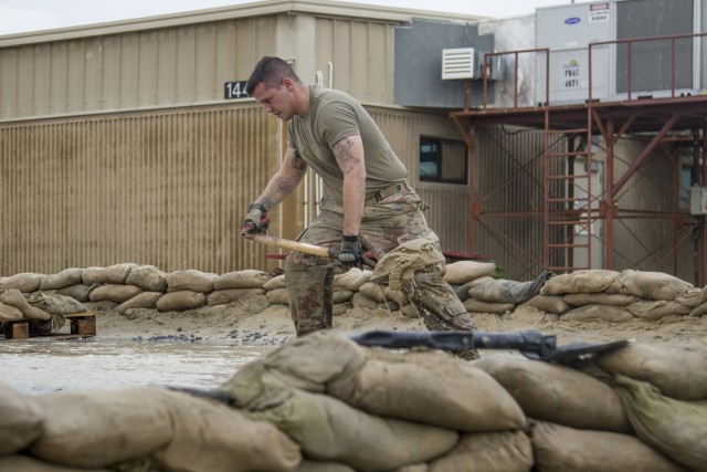 Soldiers repair flood damage across Kuwait