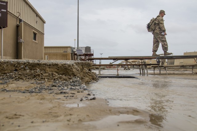 Soldiers repair flood damage across Kuwait