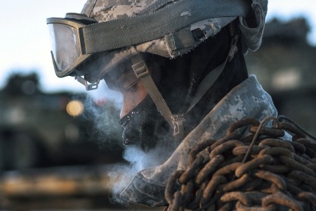 A Soldier assists with railhead operations in subzero temperatures at Joint Base Elmendorf-Richardson, Alaska, Jan. 30, 2018, as part of Arctic Thrust, a short-notice rapid deployment exercise.