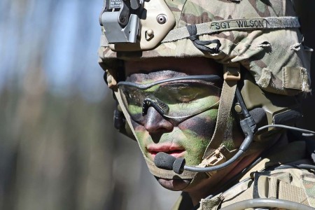 A paratrooper with the 173rd Airborne Brigade, communicates via radio during a platoon level live-fire exercise at Grafenwoehr Training Area, Germany, March 19, 2018.