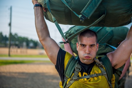 Initial Entry Trainees arrive at Fort Benning, Ga., July 13, 2018, for the first day of the 22-week One Station Unit Training extension pilot program. The new OSUT program will include expanded weapons training, increased vehicle-platform familiarization, extensive combatives training, a 40-hour combat-lifesaver certification course, increased time in the field during both day and night operations, and increased emphasis on drill and ceremony maneuvers.