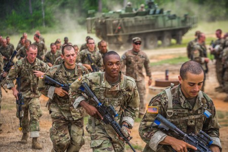 Trainees from the 50th Infantry Regiment at Fort Benning, Ga., conduct urban operations training, July 13, 2018. Soldiers practiced clearing rooms, securing courtyards and moving between buildings in a complex urban environment while utilizing...