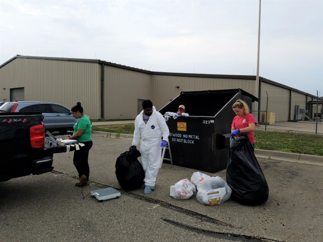 Weighing solid waste