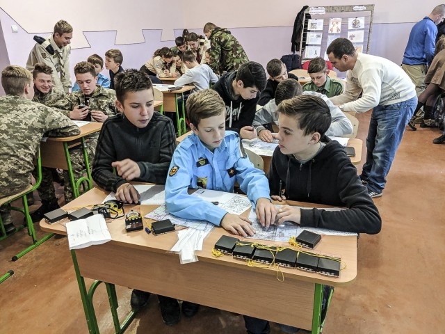 U.S. and Ukrainian service members teach Boys and Girls Scouts