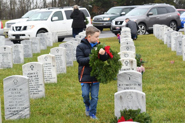 Wreaths across America, volunteers lay wreaths at Kentucky Veteran's Cemetery -Central