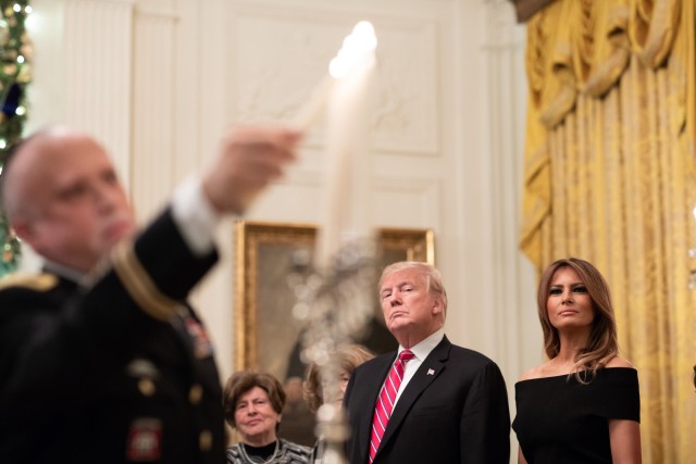 1st Inf. Div. senior chaplain lights White House menorah