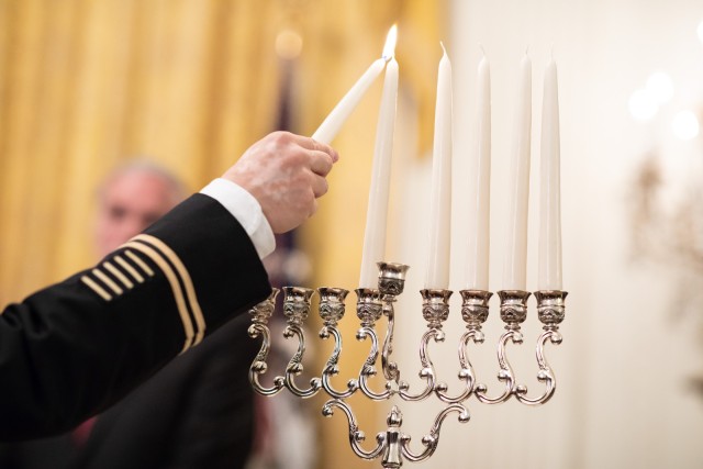 1st Inf. Div. senior chaplain lights White House menorah