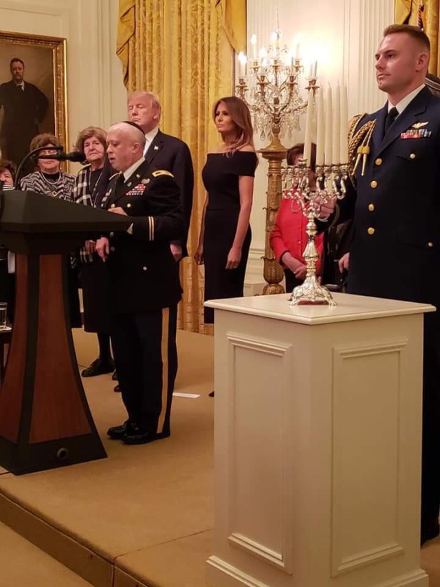 1st Inf. Div. senior chaplain lights White House menorah