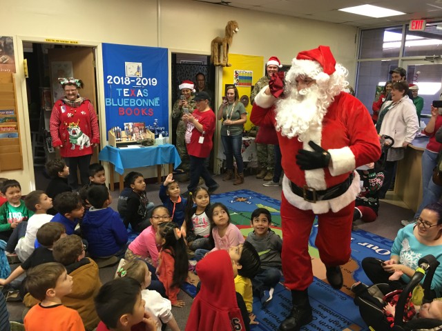 Ft. Hood general reads 'Twas the Night Before Christmas' to Florence, Texas kindergarteners Thursday