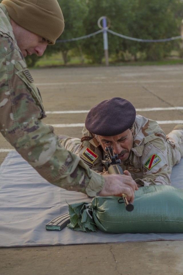 Soldiers provide marksmanship tips in Iraq