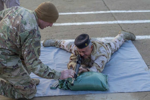 Soldiers provide marksmanship tips in Iraq