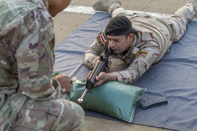 Soldiers provide marksmanship tips in Iraq