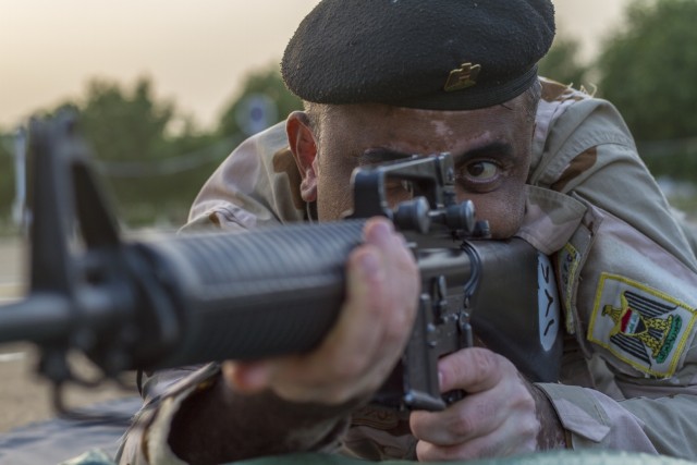 Soldiers provide marksmanship tips in Iraq