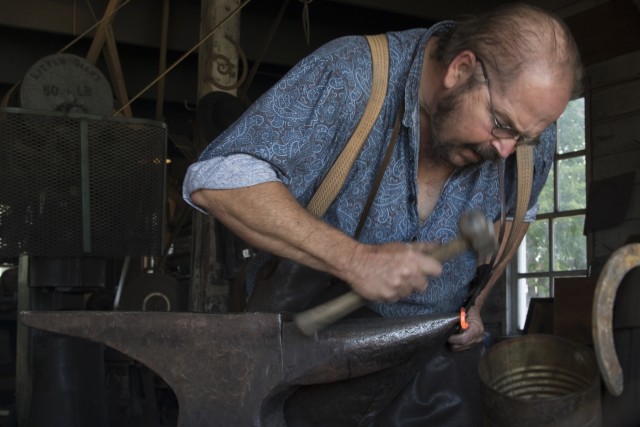 Blacksmith forges small tokens of thanks for USA's heroes